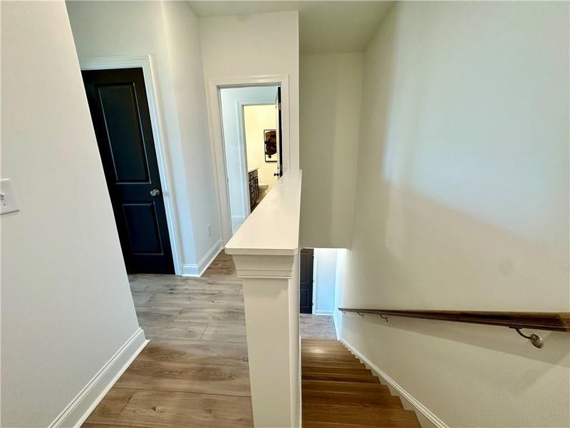 Upper Level features Guest Bedroom 2 & Owners Suite *Photos Showcase Warm Wheat Design Collection from a different Staged Model Home Site*