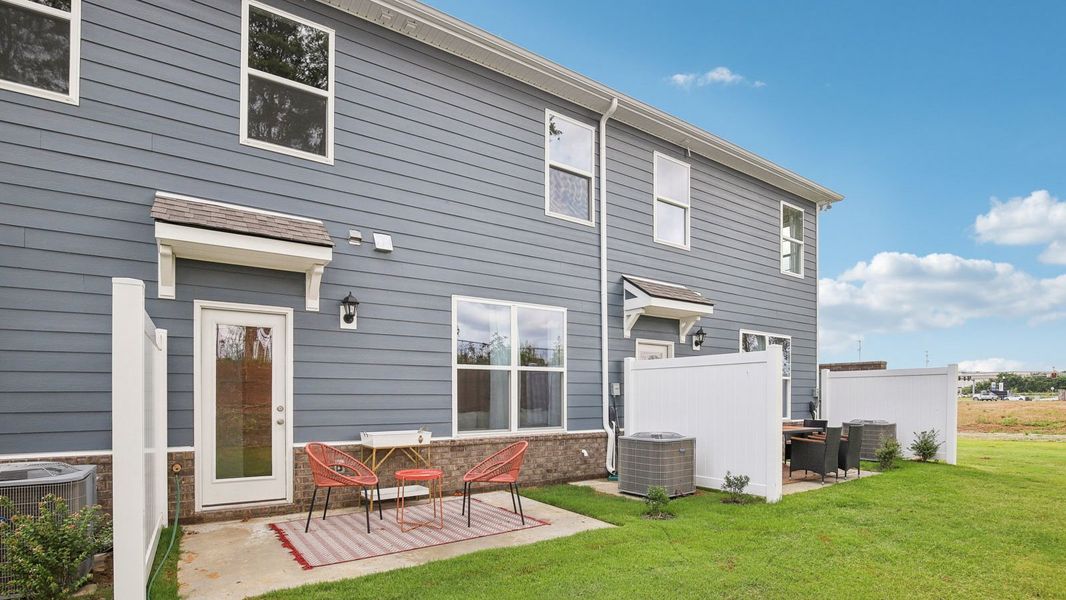 Exterior details and patio area of a home in River Landing Townhomes, Murfreesboro (Image 22). Exterior details and patio area of a home in River Landing Townhomes, Murfreesboro (Image 22).