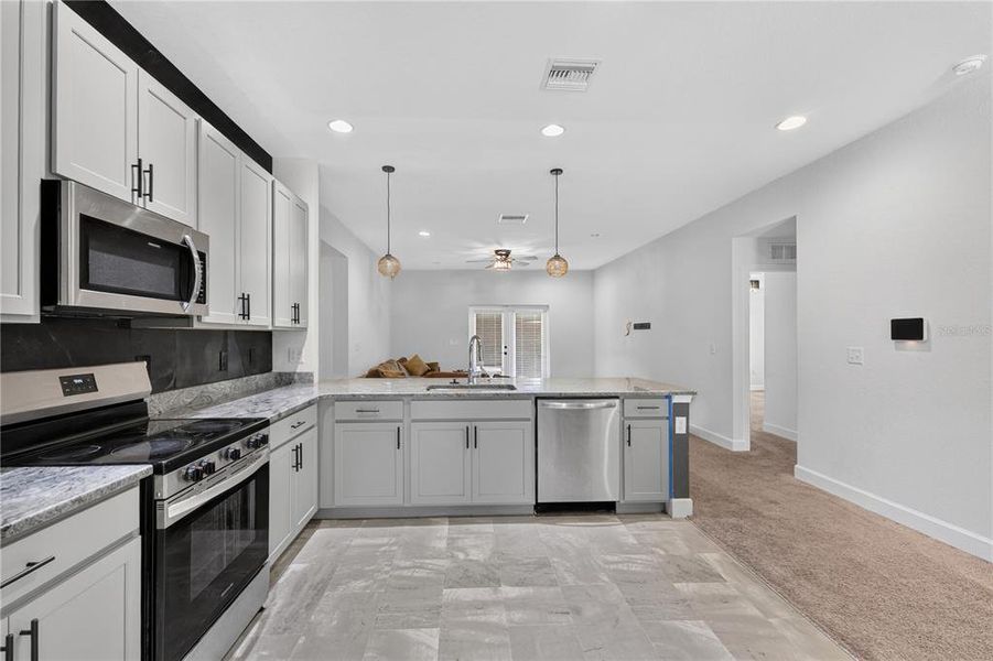 Furnished interior view inside a new home in , Sebring (Image 12).