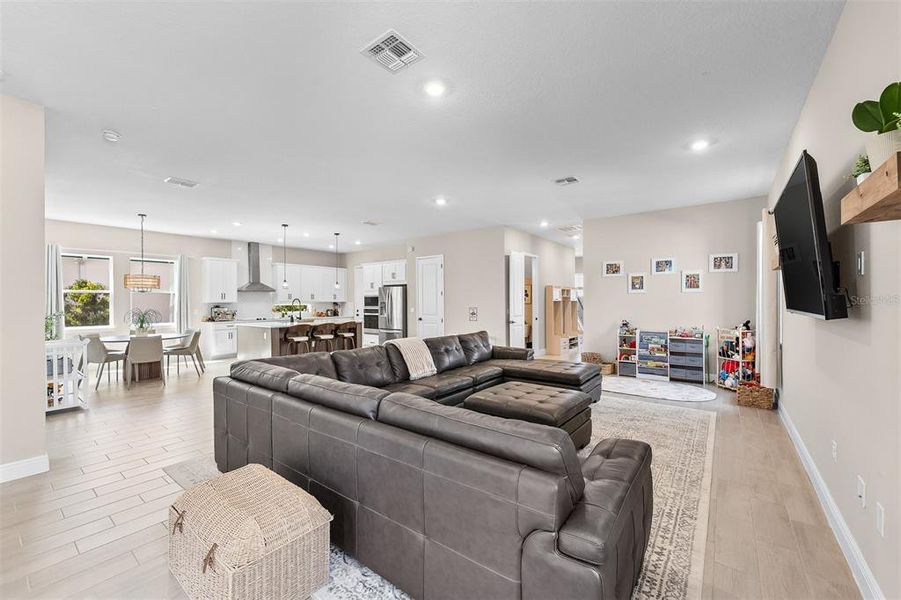 Furnished interior view inside a new home in Laureate Park, Orlando (Image 18).