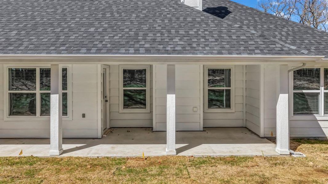 Exterior details and patio area of a home in , Poolville (Image 23).