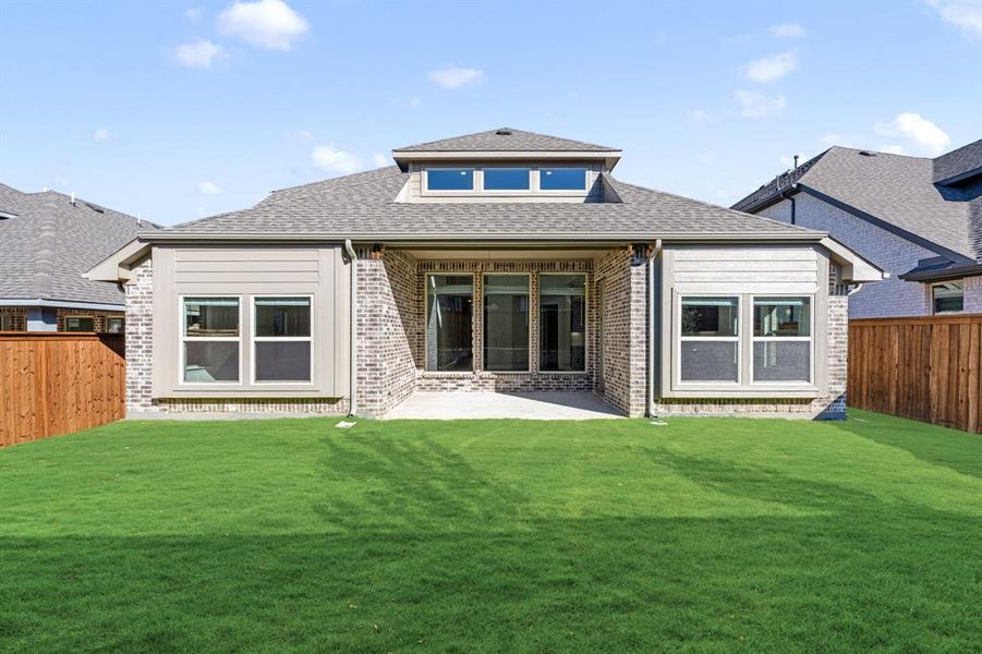 Exterior details and patio area of a home in Creekview Meadows, Pilot Point (Image 4).