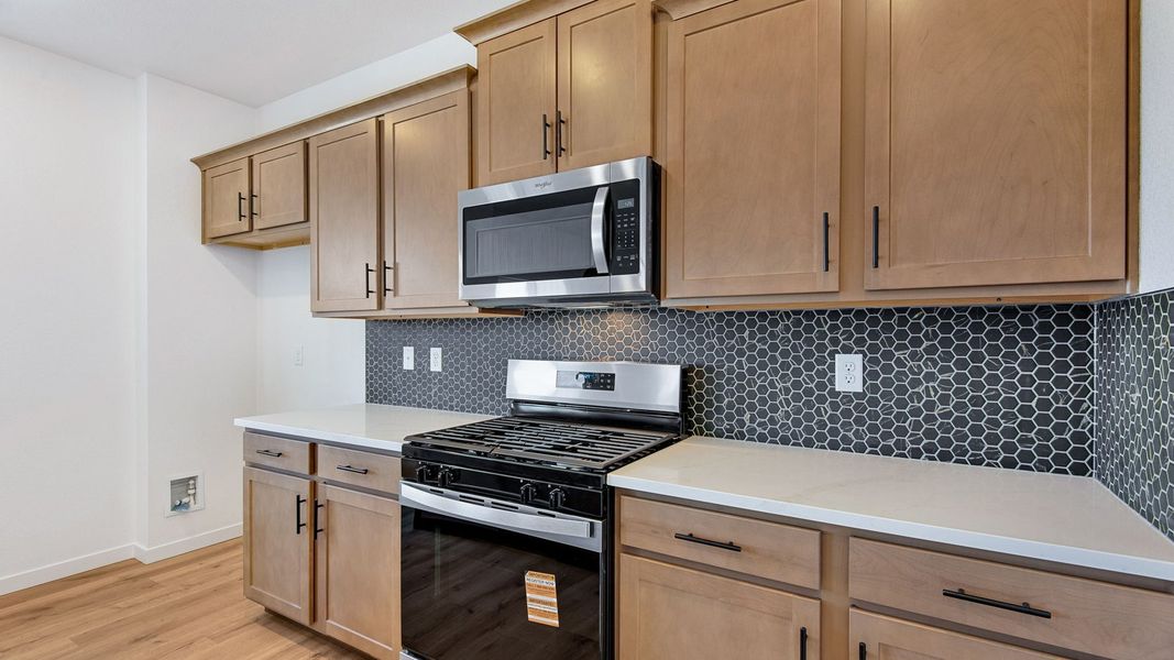 Furnished interior view inside a new home in Trails at Crowfoot, Parker (Image 10). Furnished interior view inside a new home in Trails at Crowfoot, Parker (Image 10).
