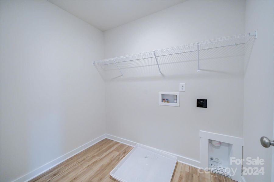 Laundry Room upstairs features EVP flooring