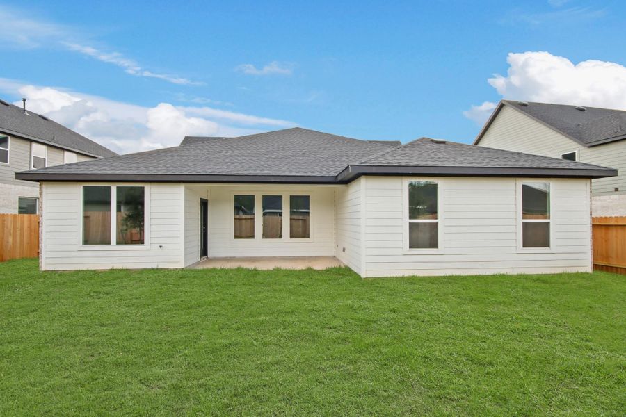 Front exterior of a new home in Silverthorne, Conroe, TX, highlighting curb appeal (Image 1). Front exterior of a new home in Silverthorne, Conroe, TX, highlighting curb appeal (Image 1).