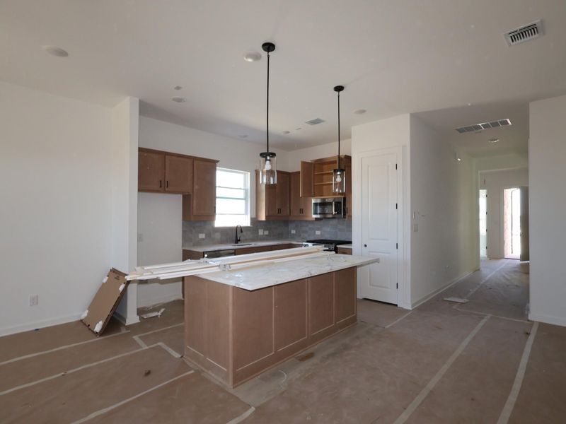 In-progress construction of a new home in Heritage, Dripping Springs, TX (Image 14).