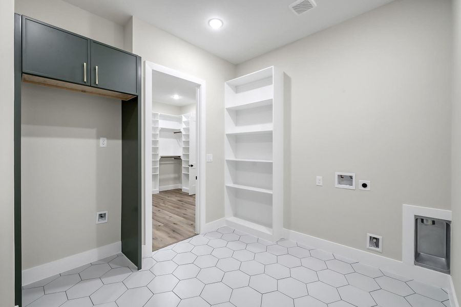 Laundry room with room for second refrigerator Laundry room with room for second refrigerator