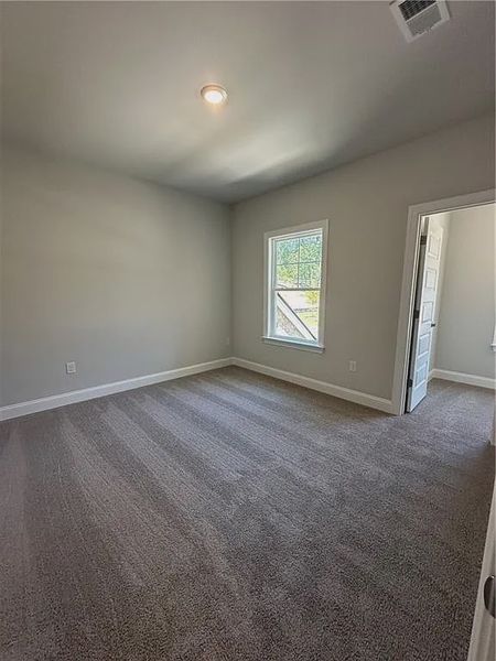 Spacious, unfurnished interior of a new home in Mirror Lake at South Harbour, Villa Rica (Image 30).