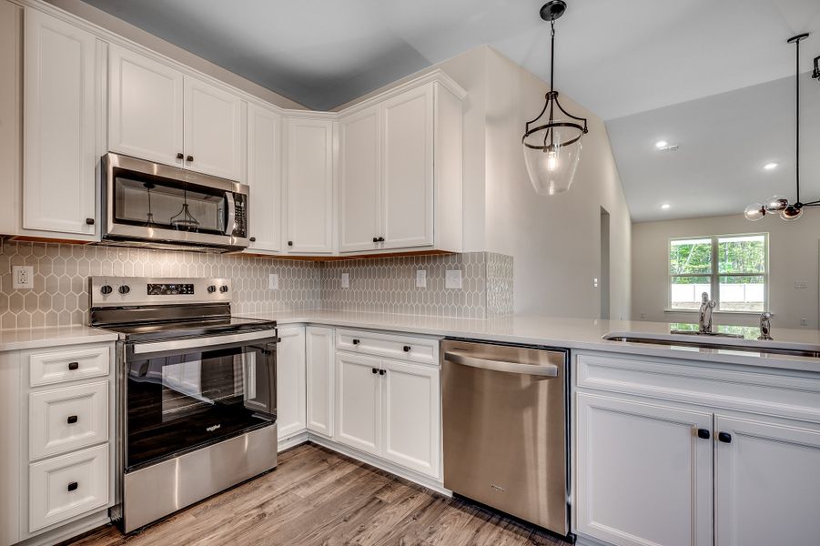 Furnished interior view inside a new home in Sunset Landing, Little River (Image 7).