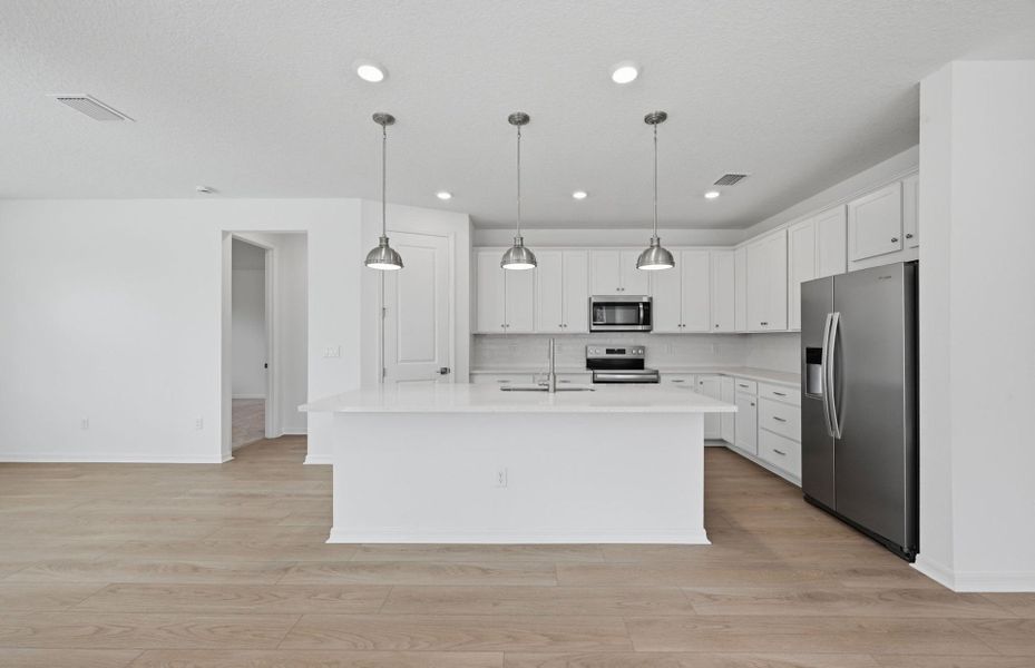 Furnished interior view inside a new home in Fiddler's Cove, Kingsland (Image 14).