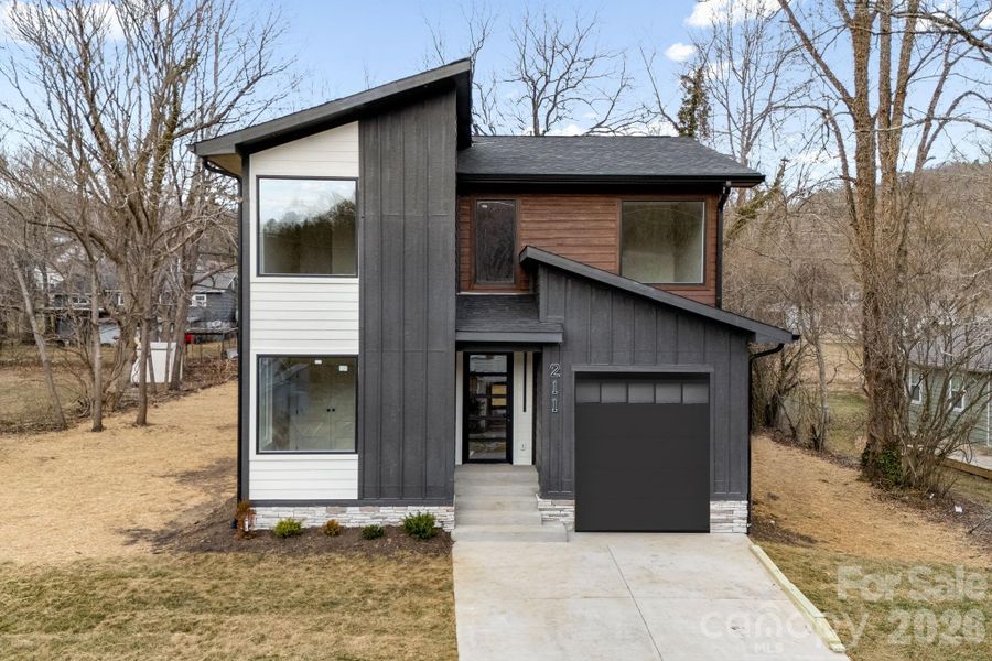 Front exterior of a new home in , Black Mountain, NC, highlighting curb appeal (Image 22).