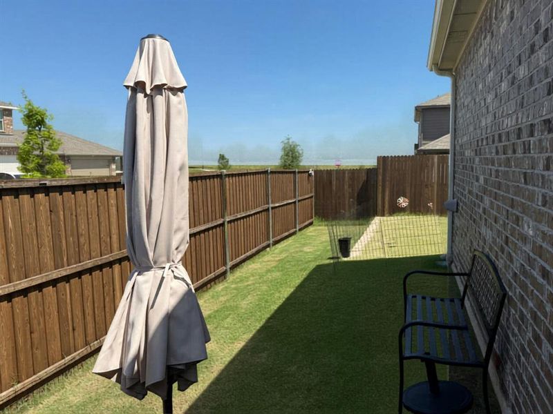 Exterior details and patio area of a home in , Crandall (Image 3).