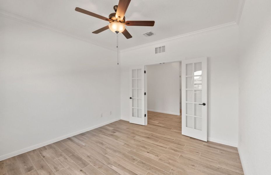 Representative unfurnished interior of a home built from the McKinney by Pulte Homes in Crescent Bluff, Georgetown (Image 12).