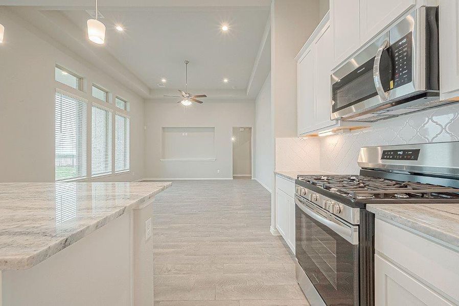 Furnished interior view inside a new home in Grand Magnolia, Magnolia (Image 11).