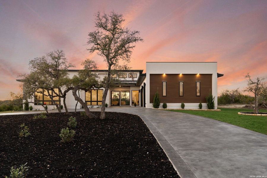 Front exterior of a new home in , Boerne, TX, highlighting curb appeal (Image 24). Front exterior of a new home in , Boerne, TX, highlighting curb appeal (Image 24).