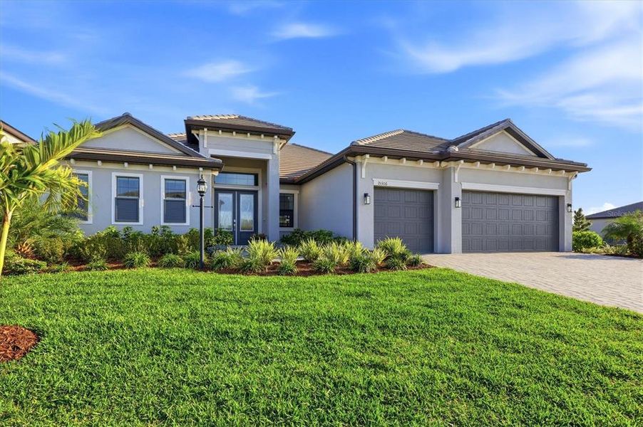 Front exterior of a new home in , Bradenton, FL, highlighting curb appeal (Image 20).