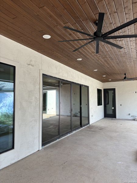 Exterior details and patio area of a home in , New Braunfels (Image 28).