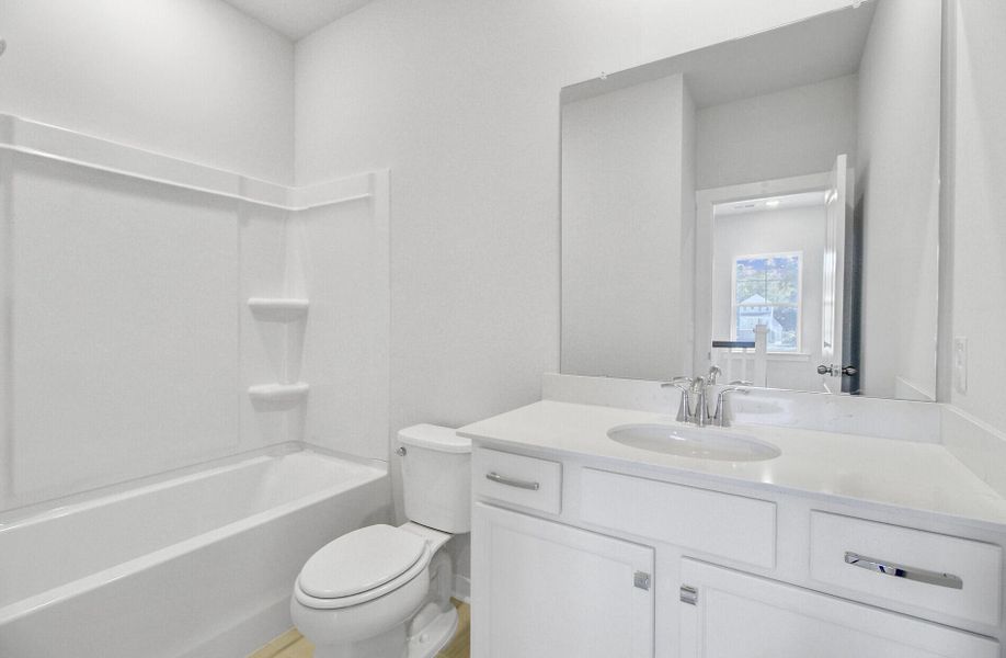 Furnished interior view inside a new home in Indigo Grove Townhomes, Johns Island (Image 9).