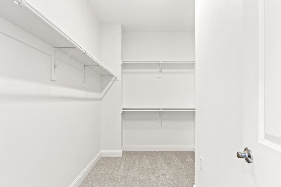 Spacious, unfurnished interior of a new home in The Tribute, The Colony (Image 34).