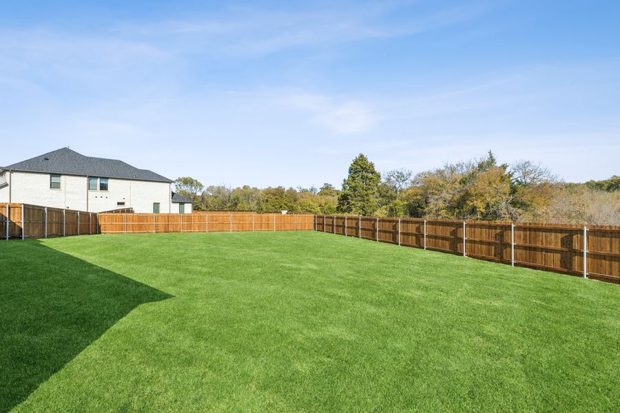 Covered Patio in the Gilmour II home plan by Trophy Signature Homes – REPRESENTATIVE PHOTO