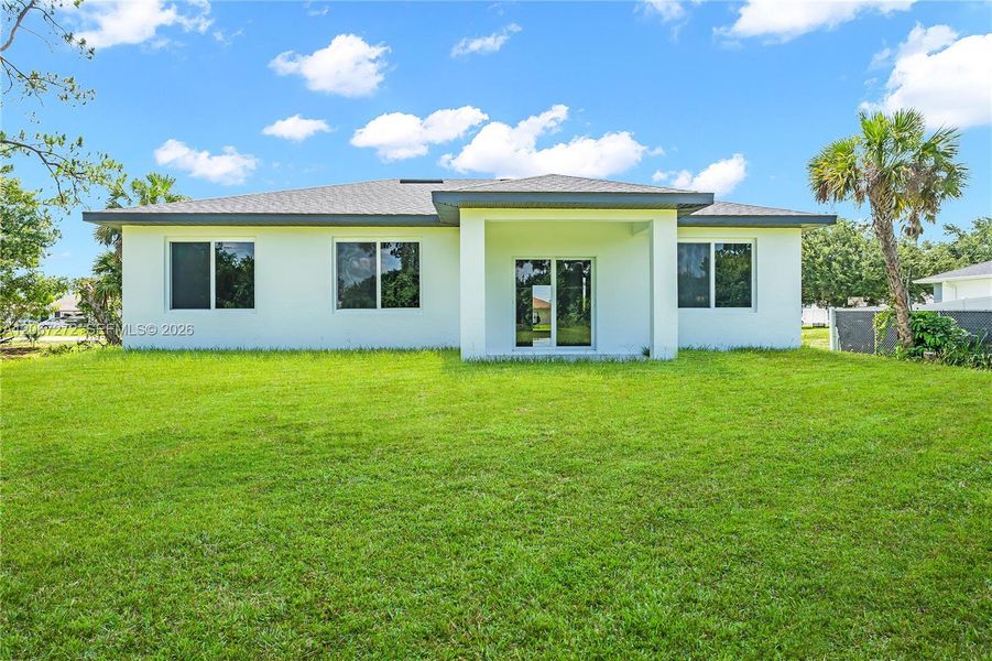 Exterior details and patio area of a home in , Lehigh Acres (Image 4). Exterior details and patio area of a home in , Lehigh Acres (Image 4).