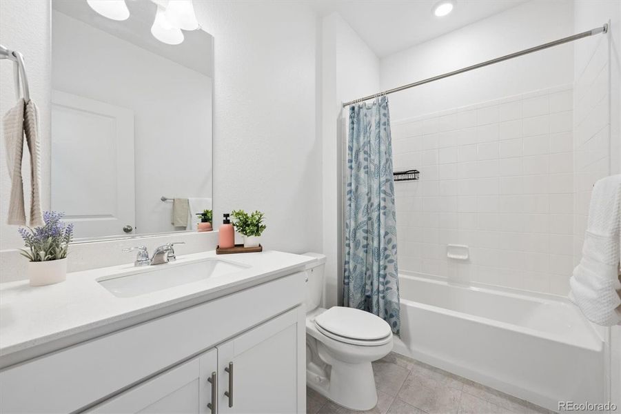 Spacious secondary full bathroom. Spacious secondary full bathroom.