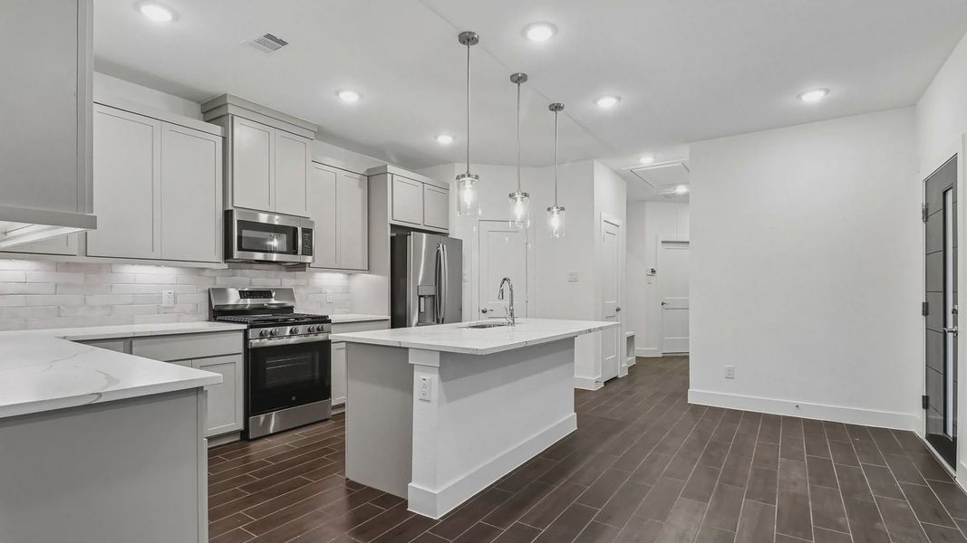 Furnished interior view inside a new home in Meridiana Townhomes, Manvel (Image 13).