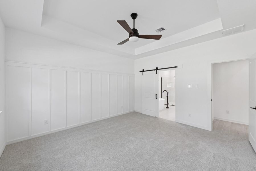 Private primary suite with feature wall (*Photo not of actual home and used for illustration purposes only.) Private primary suite with feature wall (*Photo not of actual home and used for illustration purposes only.)