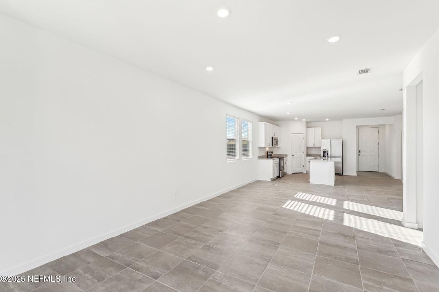 Spacious, unfurnished interior of a new home in Lakes at Bella Lago - Signature Series, Green Cove Springs (Image 12). Spacious, unfurnished interior of a new home in Lakes at Bella Lago - Signature Series, Green Cove Springs (Image 12).