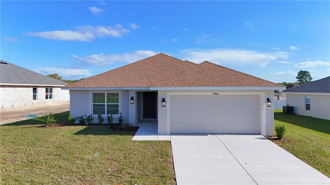 Front exterior of a new home in , Ocala, FL, highlighting curb appeal (Image 16). Front exterior of a new home in , Ocala, FL, highlighting curb appeal (Image 16).