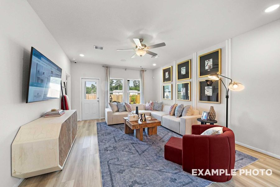 Furnished interior view inside a new home in Caney Creek Place, Conroe (Image 7).