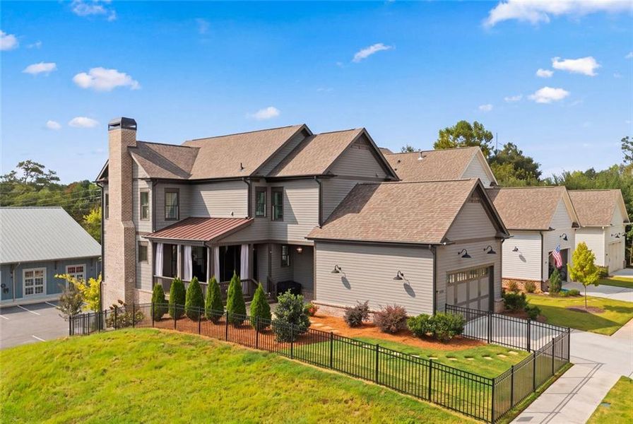 Front exterior of a new home in Crossroads, Milton, GA, highlighting curb appeal (Image 21).