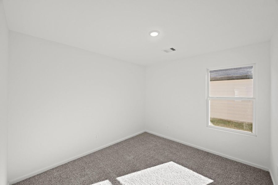 Spacious, unfurnished interior of a new home in The Canopies, Splendora (Image 18).