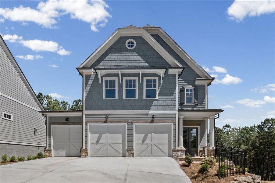 Front exterior of a new home in , Canton, GA, highlighting curb appeal (Image 21). Front exterior of a new home in , Canton, GA, highlighting curb appeal (Image 21).
