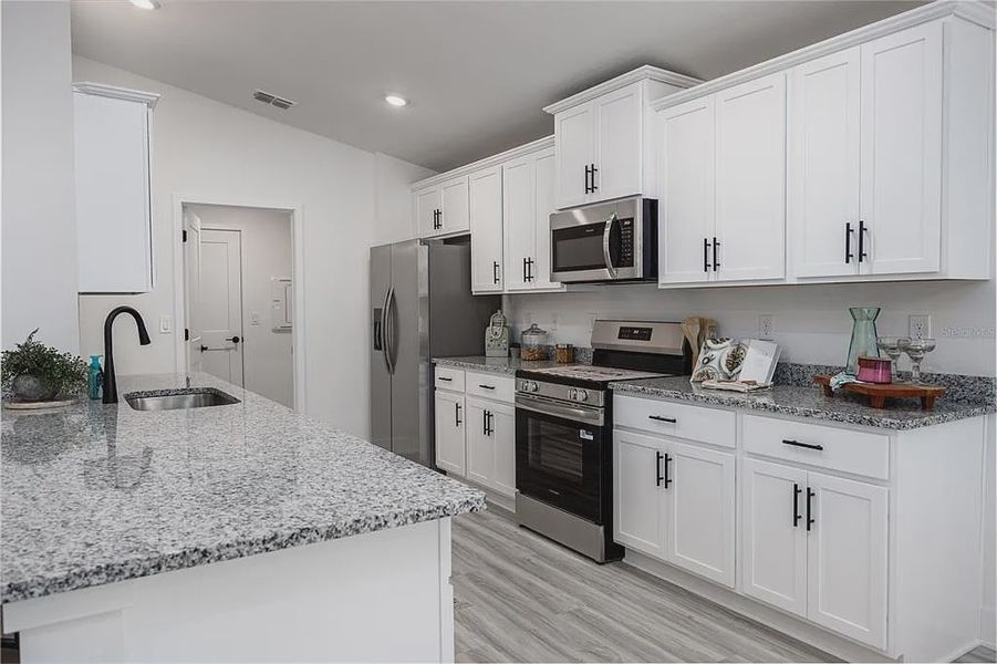 Furnished interior view inside a new home in Briarwood, Alachua (Image 9).