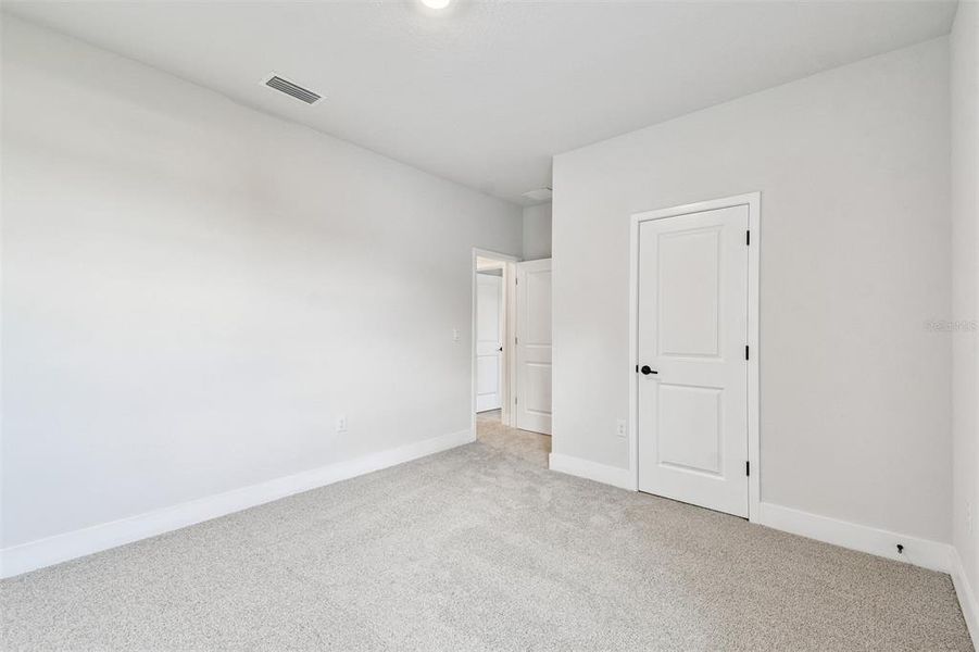 Spacious, unfurnished interior of a new home in Persimmon Park - Garden Series, Wesley Chapel (Image 24).