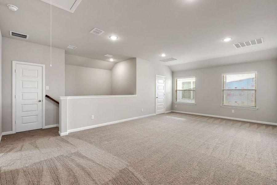 Game Room in the Sapphire home plan by Trophy Signature Homes – REPRESENTATIVE PHOTO Game Room in the Sapphire home plan by Trophy Signature Homes – REPRESENTATIVE PHOTO