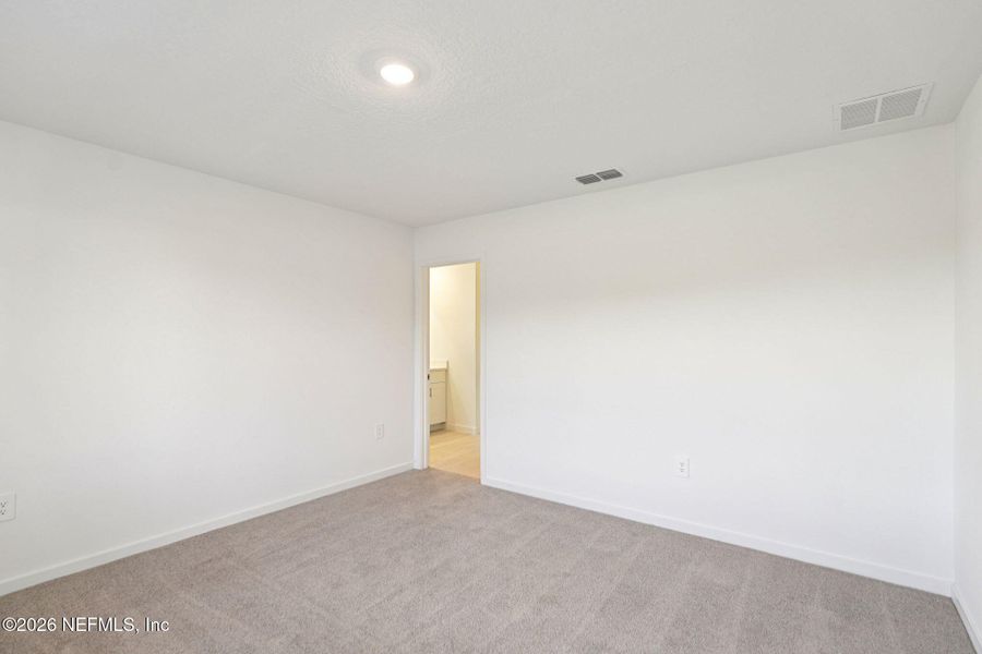 Spacious, unfurnished interior of a new home in Flagler Village - Signature Series, Palm Coast (Image 16).