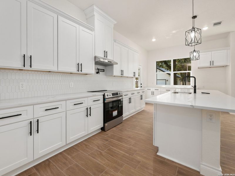 Furnished interior view inside a new home in , Elmendorf (Image 27).