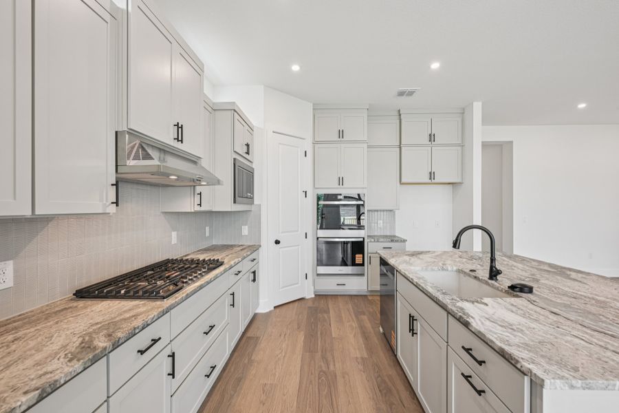 Furnished interior view inside a new home in Persimmon, Buda (Image 5).