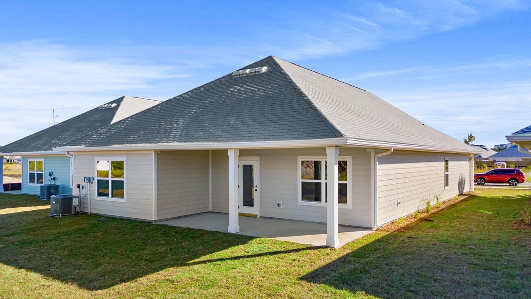 Exterior details and patio area of a home in Caballeros Estates At Hombre, Panama City Beach (Image 4). Exterior details and patio area of a home in Caballeros Estates At Hombre, Panama City Beach (Image 4).