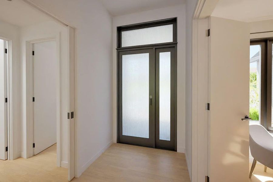 Welcoming foyer with wide-plank European white oak flooring that sets an elegant tone throughout the home. Welcoming foyer with wide-plank European white oak flooring that sets an elegant tone throughout the home.