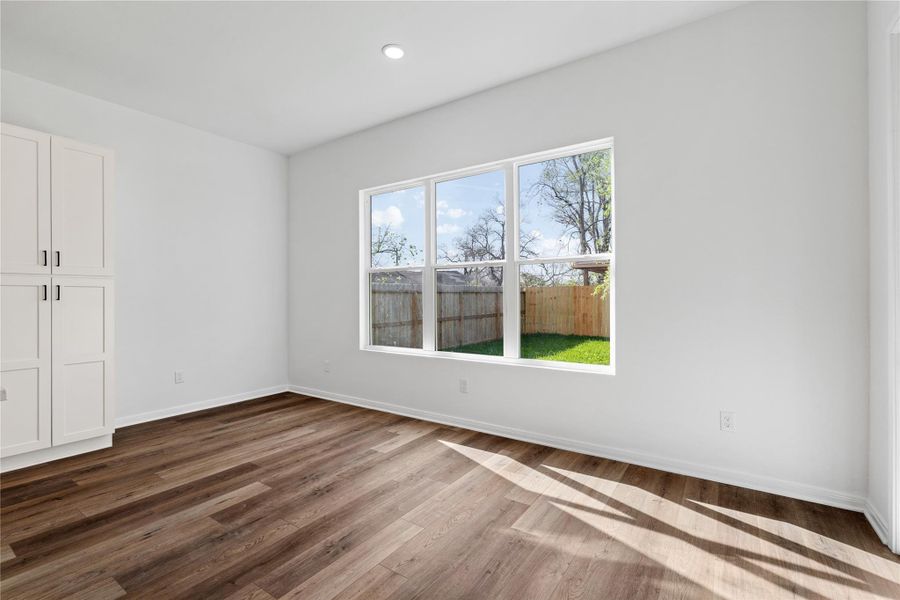 Spacious dining area that over looks the backyard.