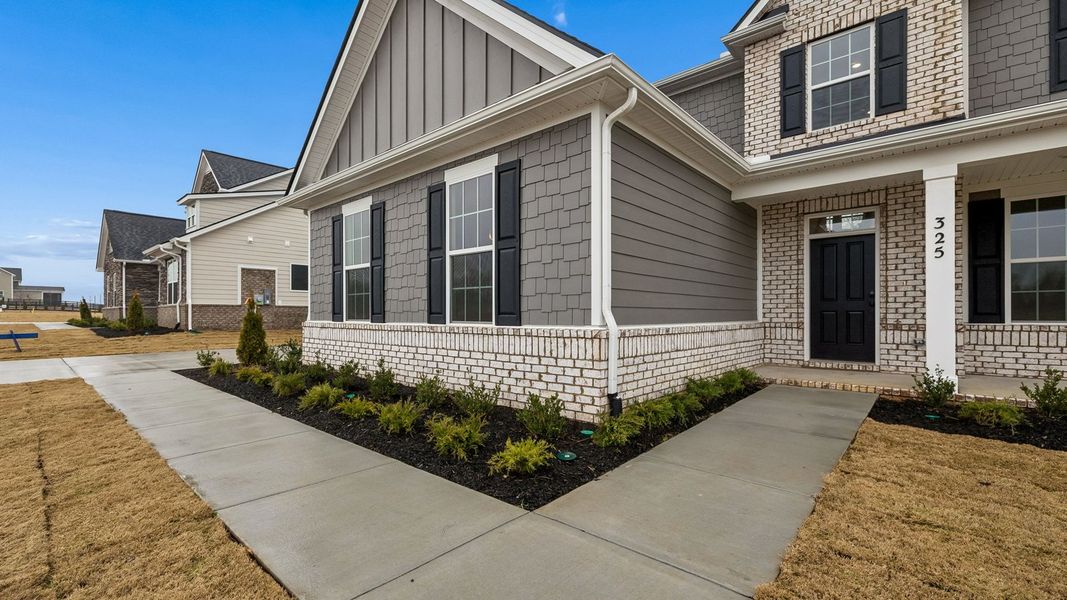 Exterior details and patio area of a home in Harvest Point, Spring Hill (Image 3).