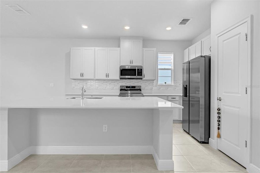 Furnished interior view inside a new home in , St. Cloud (Image 10).