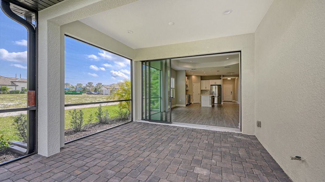 Exterior details and patio area of a home in Boca Royale Golf and Country Club at Wellen Park, Englewood (Image 22).