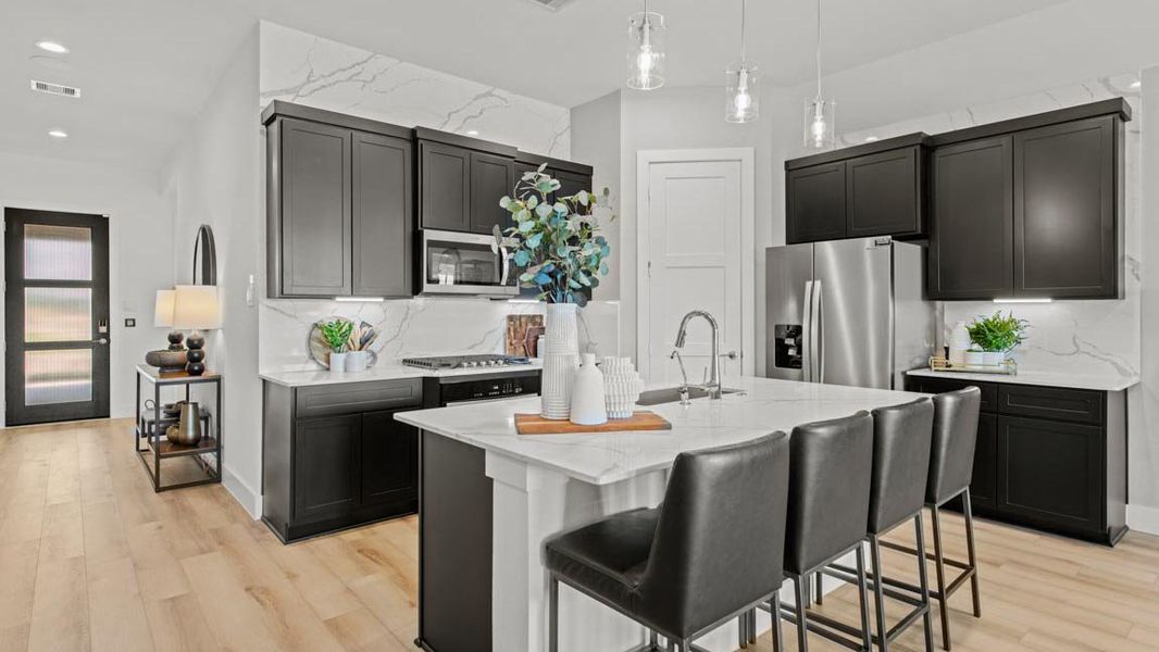 Furnished interior view inside a new home in Hills of Westlake, Conroe (Image 8).