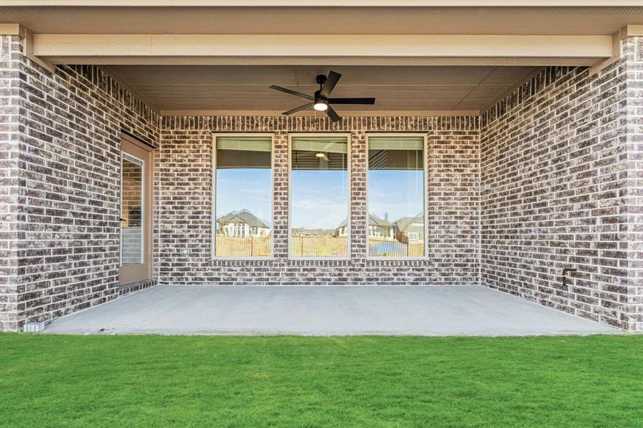 Exterior details and patio area of a home in Parks at Panchasarp Farms 55-60, Burleson (Image 4).
