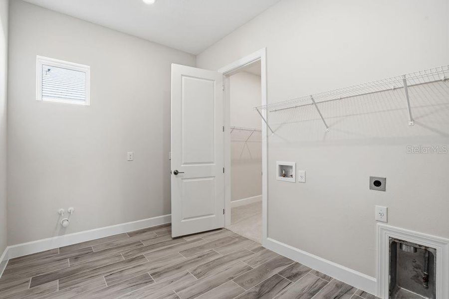 Spacious, unfurnished interior of a new home in Coasterra Community Group Page, Palmetto (Image 29).