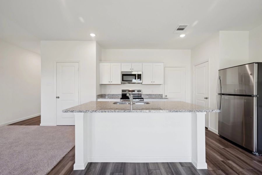 Representative furnished interior of a home built from the Voyager by Starlight Homes in Oakfield Lakes, Parrish (Image 10).